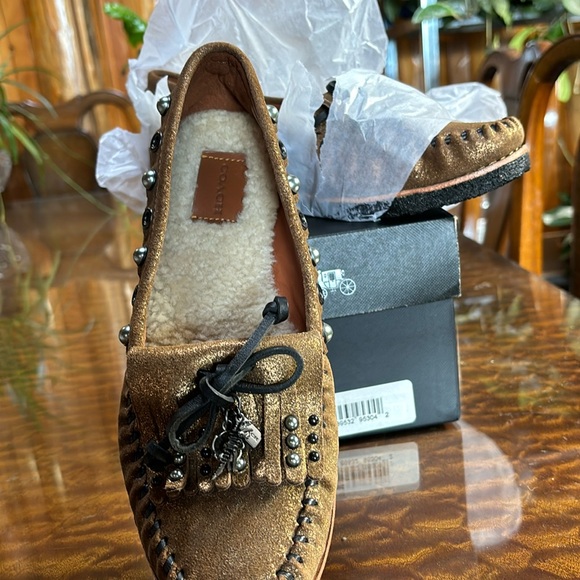 Coach gold Roccasin slipon.   Never worn - Picture 1 of 5